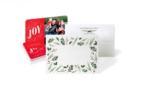 joy red Christmas photo card with back of card design with green leaves and mistletoe and back of card design