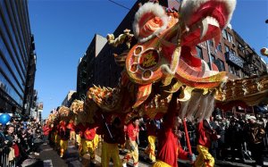 Performers play the dragon dance during the Chinese New Year parade